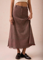 A Model Wearing Brown Handwoven Cotton The Hazel Sun Handspun Handwoven Organic Cotton Midi Skirt, curated by Only Ethikal